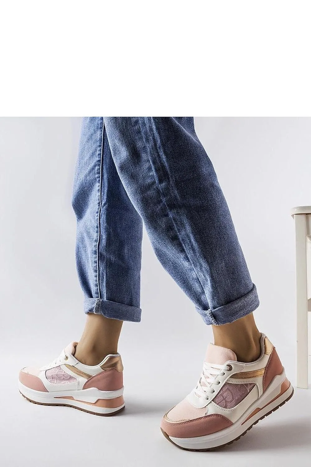 Black sneakers with an elegant insert