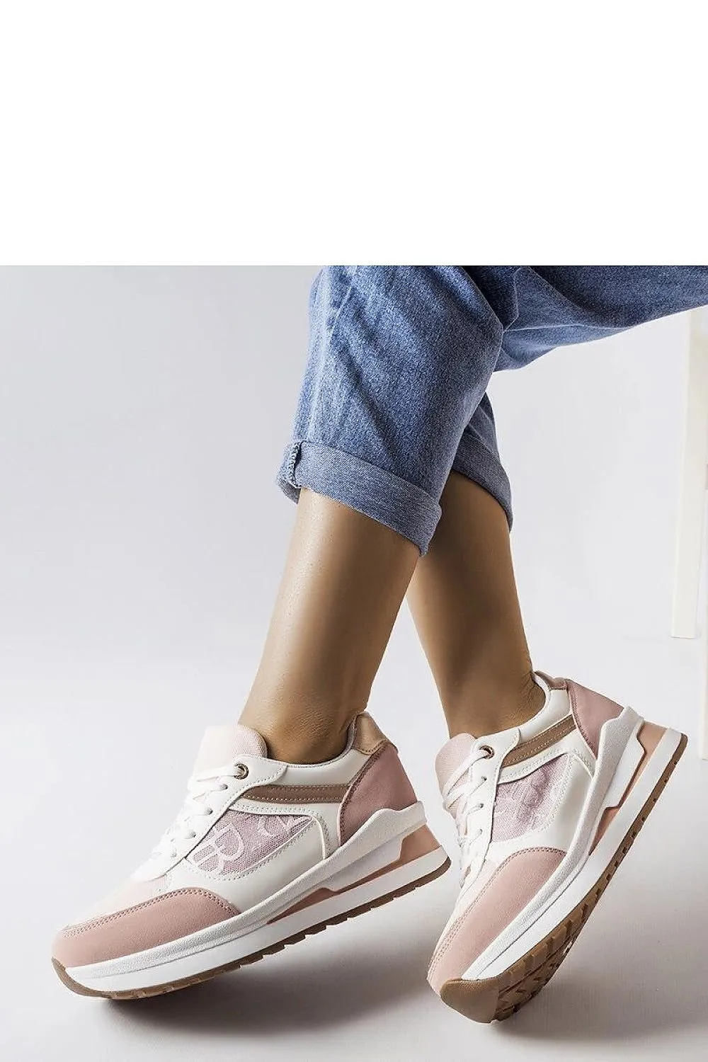 Black sneakers with an elegant insert
