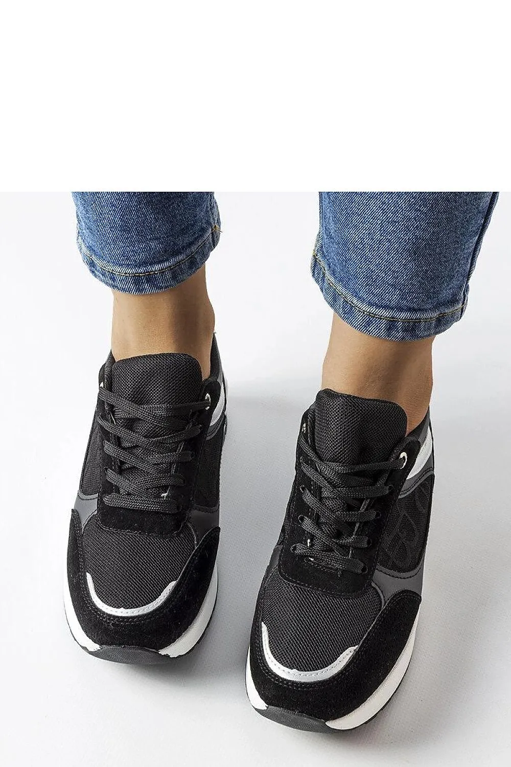 Black sneakers with an elegant insert